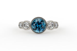Five Stone Montana Sapphire Bezel Ring With Diamond Side Stones - S. Kind & Co